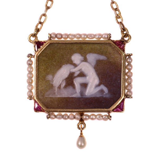 Antique stone cameo pendant on gold chain with mythological motive